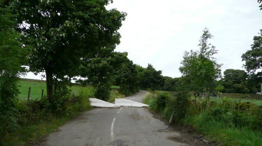 Barriers close the road. See 921343