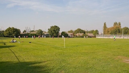 Lloyd Recreation Ground, Marchwood There is a children's playground off-picture left, tennis courts at right, and some kind of hall or pavilion off-picture right.