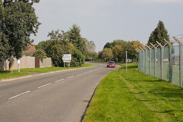Normandy Way, Marchwood Perimeter fence of Marchwood Military Port on the right.