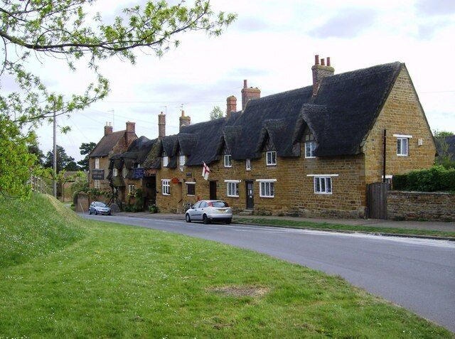 Althorp Inn and its neighbours The Althorp Inn, also known as the Fox and Hounds, is at the far end of the row. Next to it is the Post Office then a private house, all in the local ironstone with thatched rooves.