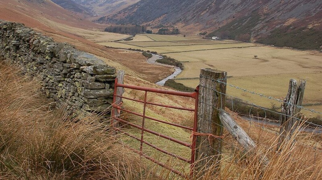 Valley of the Caldew below Carrock Fell Precious flat land by the river used for farming, with mining as another activity further up the valley.