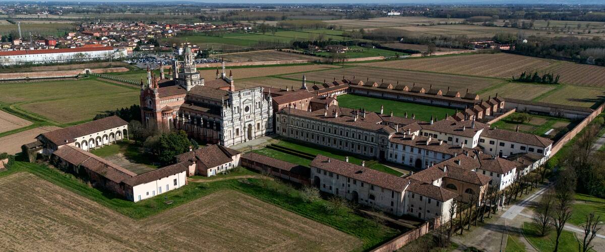 Aerial view of the Certosa di Pavia, built in the late fourteenth century, courts and the cloister of the monastery and shrine in the province of Pavia, Lombardia, Italy