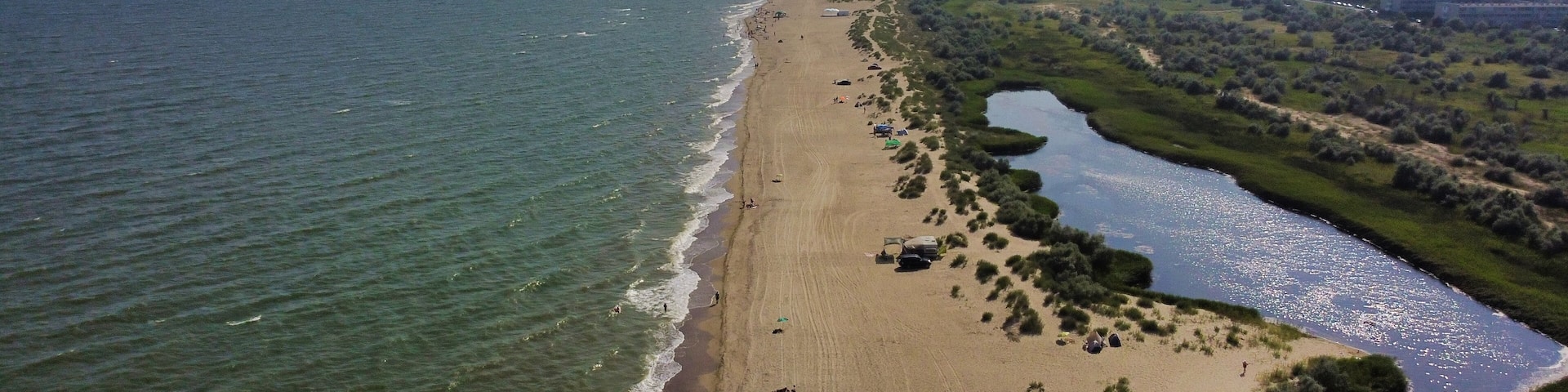 View of the Black Sea and sandy beach in Karolino-Bugaz. Salt Lake. Ukraine. Europe
