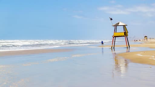 Sunny day with waves and blue sky at Balneario da Gaivota, Santa catarina. Torres in backgorund.; Shutterstock ID 523872748; Purchase Order: -