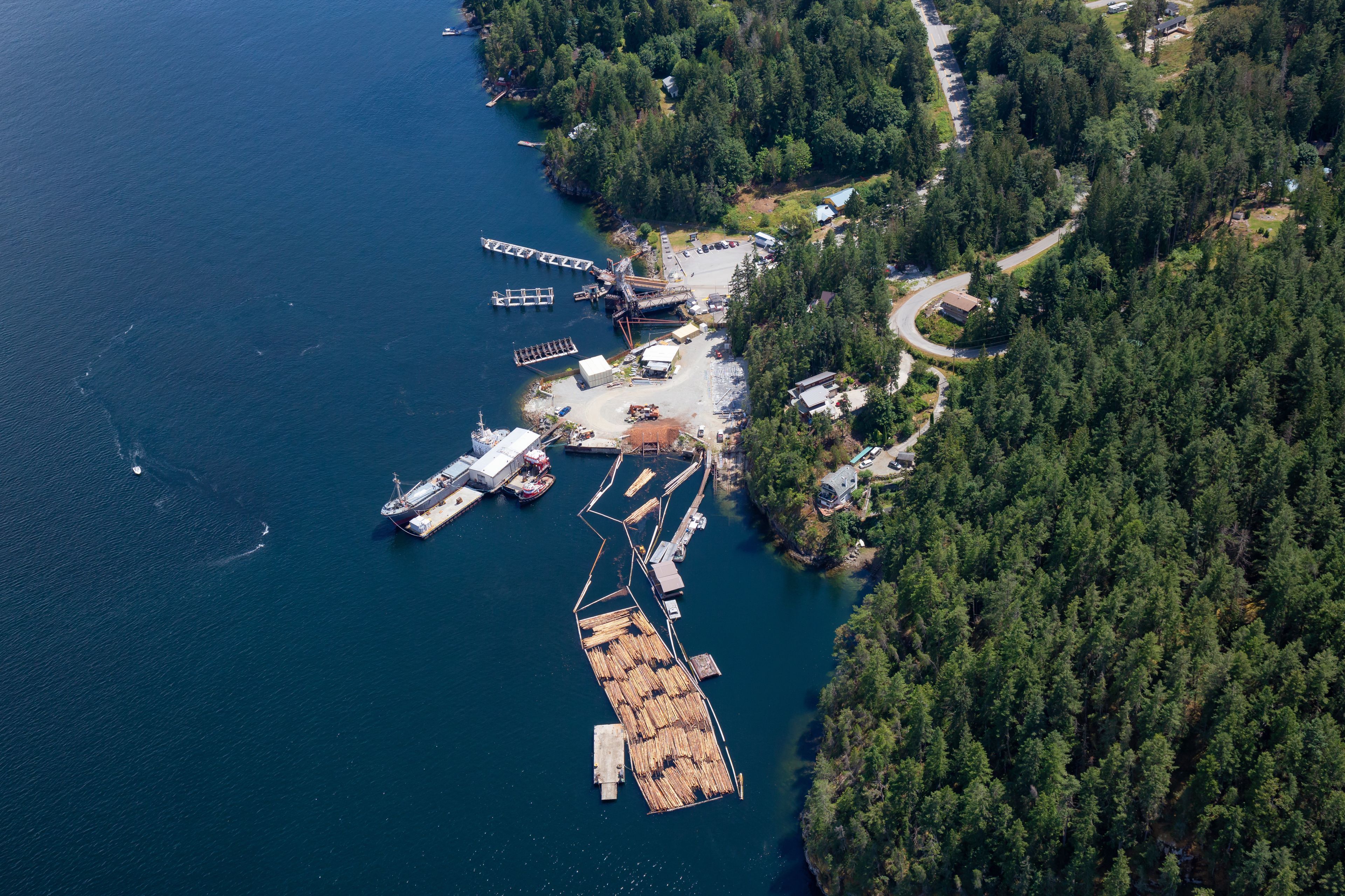 Aerial view of the Ferry Terminal in Earls Cove during a sunny summer day. Taken in Sunshine Coast, BC, Canada.