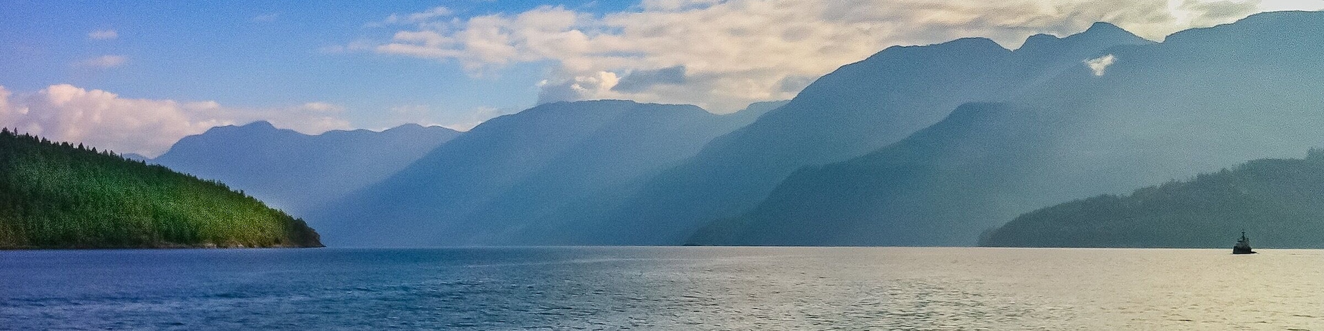 Beautiful Agamemnon Channel on the Sunshine Coast, British Columbia Canada. Dramatic cliffs rise from the deep blue waters.