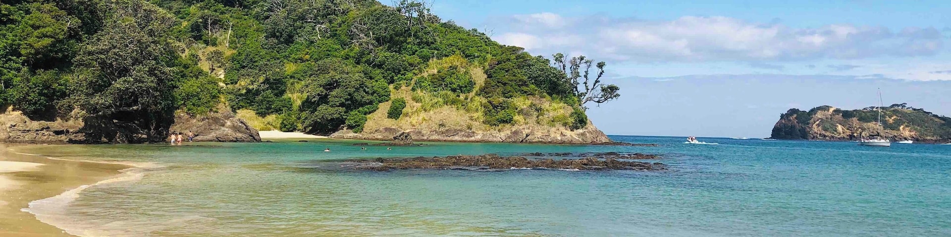 Matapouri beach is a long stretch of sand with clear turquoise water. Walk along the beach to the end then into the water to walk around a rocky outcropping to reach the last bit of beach. From there it’s a 20 minute walk up and over a hill to reach the Mermaid Pools. Deep blue tide pools that you can swim in, worth the extra work to get there.