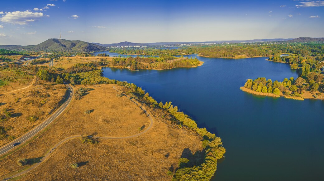 Aerial panorama of scenic Lake Burley Griffin in Canberra at sunset