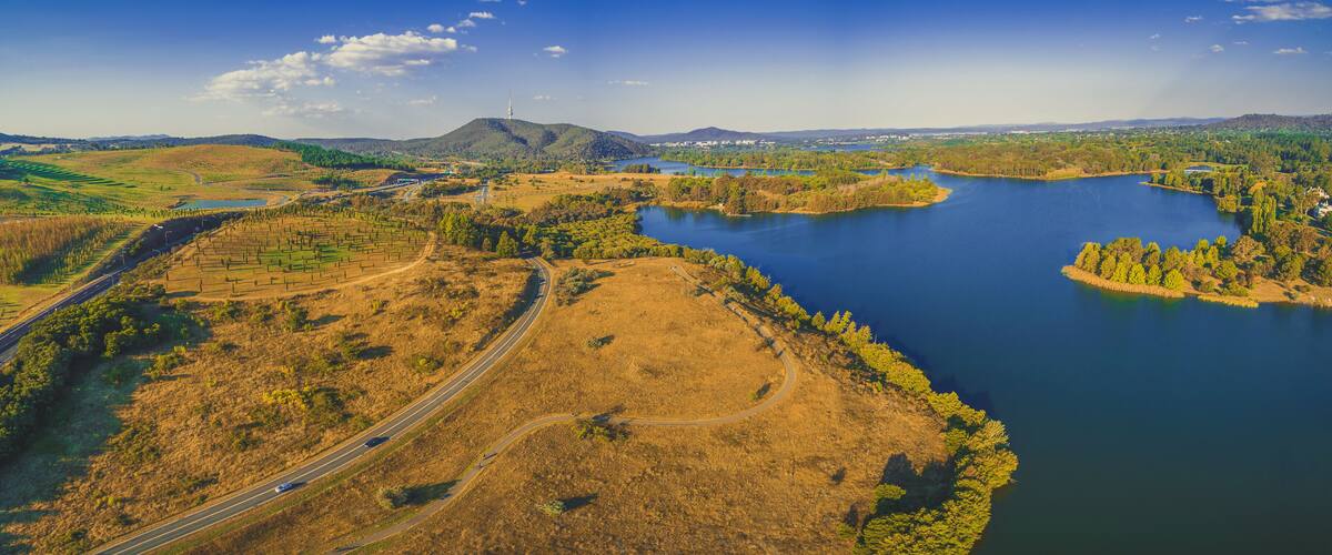Aerial panorama of scenic Lake Burley Griffin in Canberra at sunset