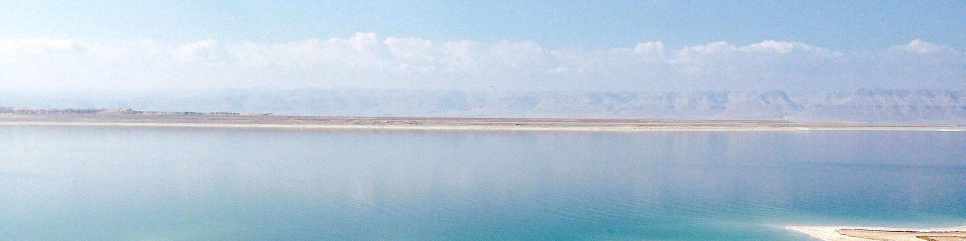 Water is like glass but no life, no boats, nothing out there. Beautiful. So weird to see such a pretty #beach that you can't swim in