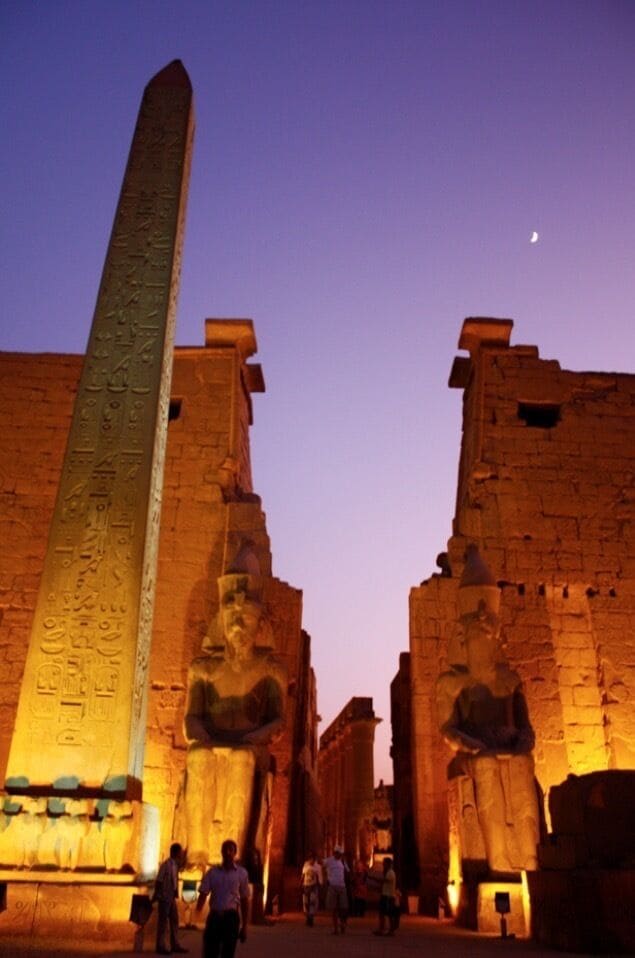 Purple Sunset at the Luxor temple.. A surreal experience! This temple is  absolutely impresive by its size, history, conservation.. And on top of that the most amaZing sunset with the moon! #egypt #luxor #history #colorful 