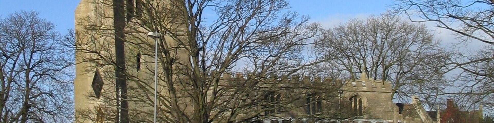 Church of St. Laurence, Surfleet. The top of the tower is 6 feet off perpendicular; a result of subsidence common on the soft ground of the Fenlands.