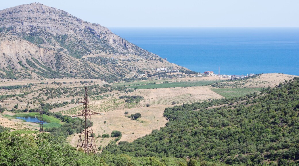 Russia, the Republic of Crimea, Sudak city district, Vesyoloe village. 06/08/2018: View of the village on the shore of the Black Sea