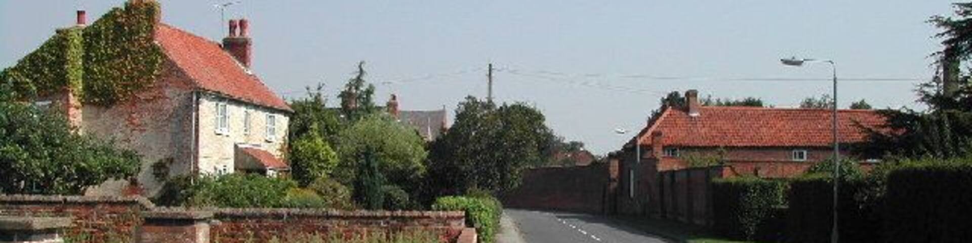 Main Street, Hoveringham. Hall Farm is top right and Flora Farm to the left