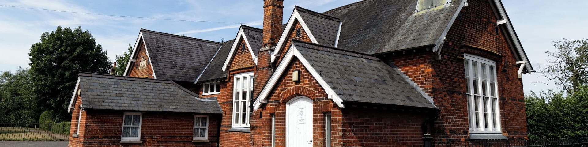 School (originally a Board School) on Crow Street at Henham, in Essex, England . Software: RAW file lens-corrected, optimized and converted to JPEG with DxO OpticsPro 10 Elite, and likely further optimized and/or cropped and/or spun with Adobe Photoshop CS2.