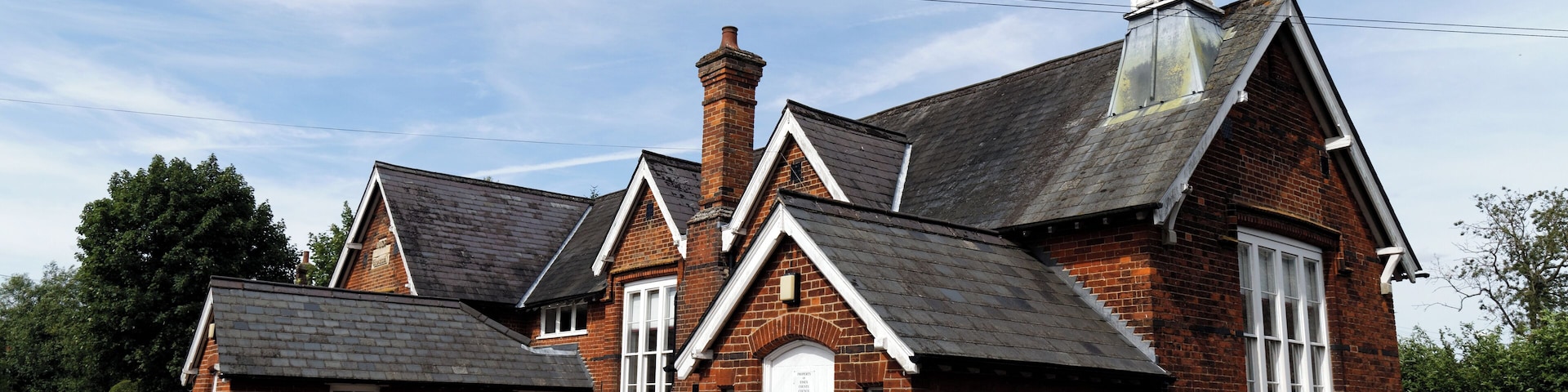 School (originally a Board School) on Crow Street at Henham, in Essex, England . Software: RAW file lens-corrected, optimized and converted to JPEG with DxO OpticsPro 10 Elite, and likely further optimized and/or cropped and/or spun with Adobe Photoshop CS2.
