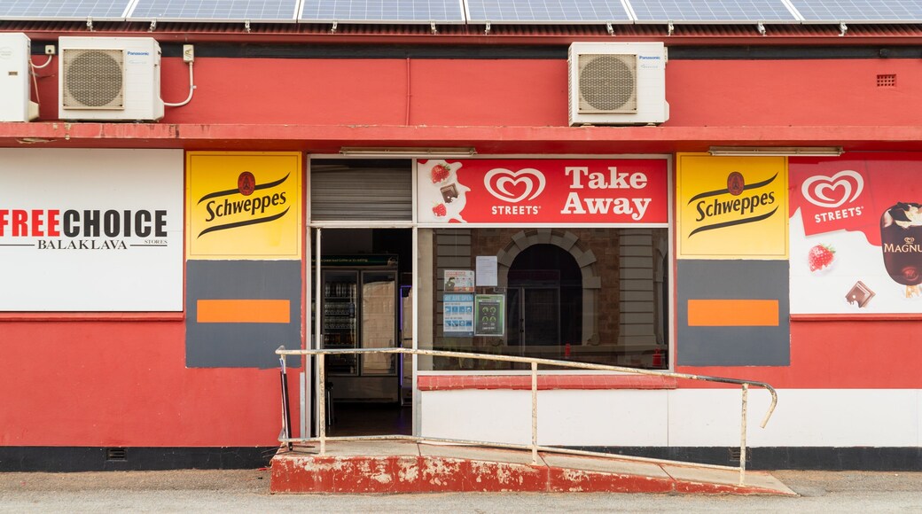 Balaklava which includes a small town or village and signage