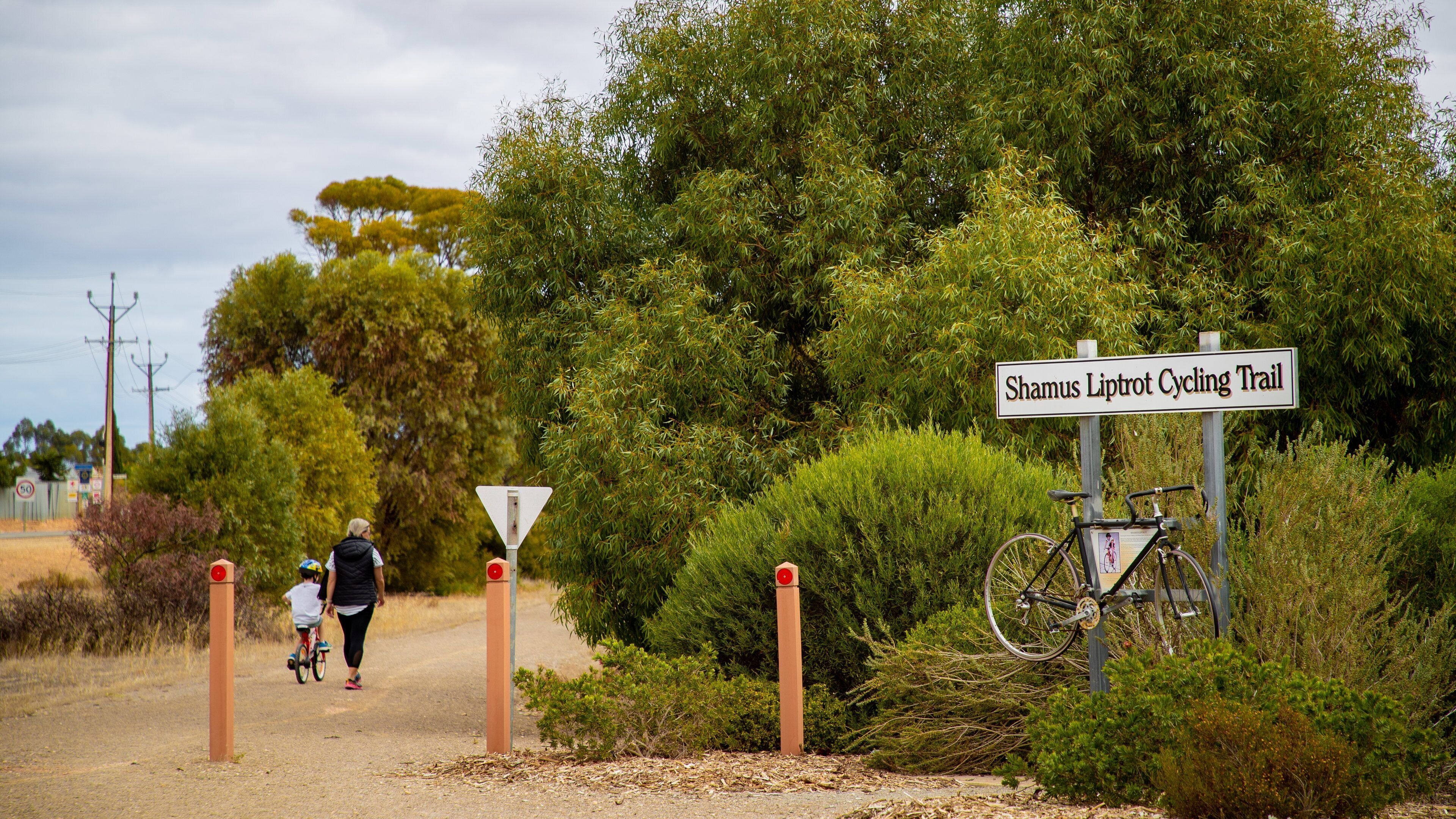 Balaklava featuring signage as well as a family