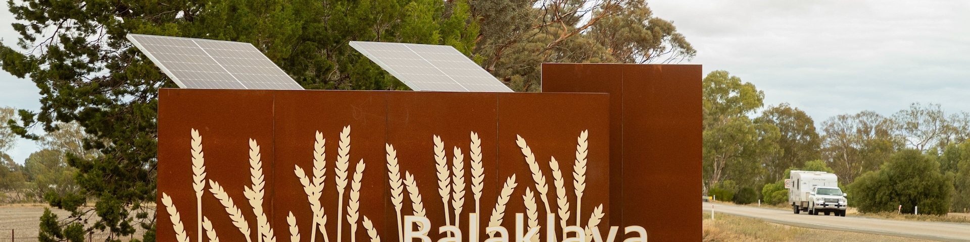 Balaklava featuring signage and tranquil scenes