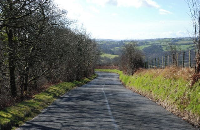 Road to Llangeitho This minor road is the usual approach to Llangeitho from the B4578 to the north. There is some good natural woodland down the slopes to the left of the road here.