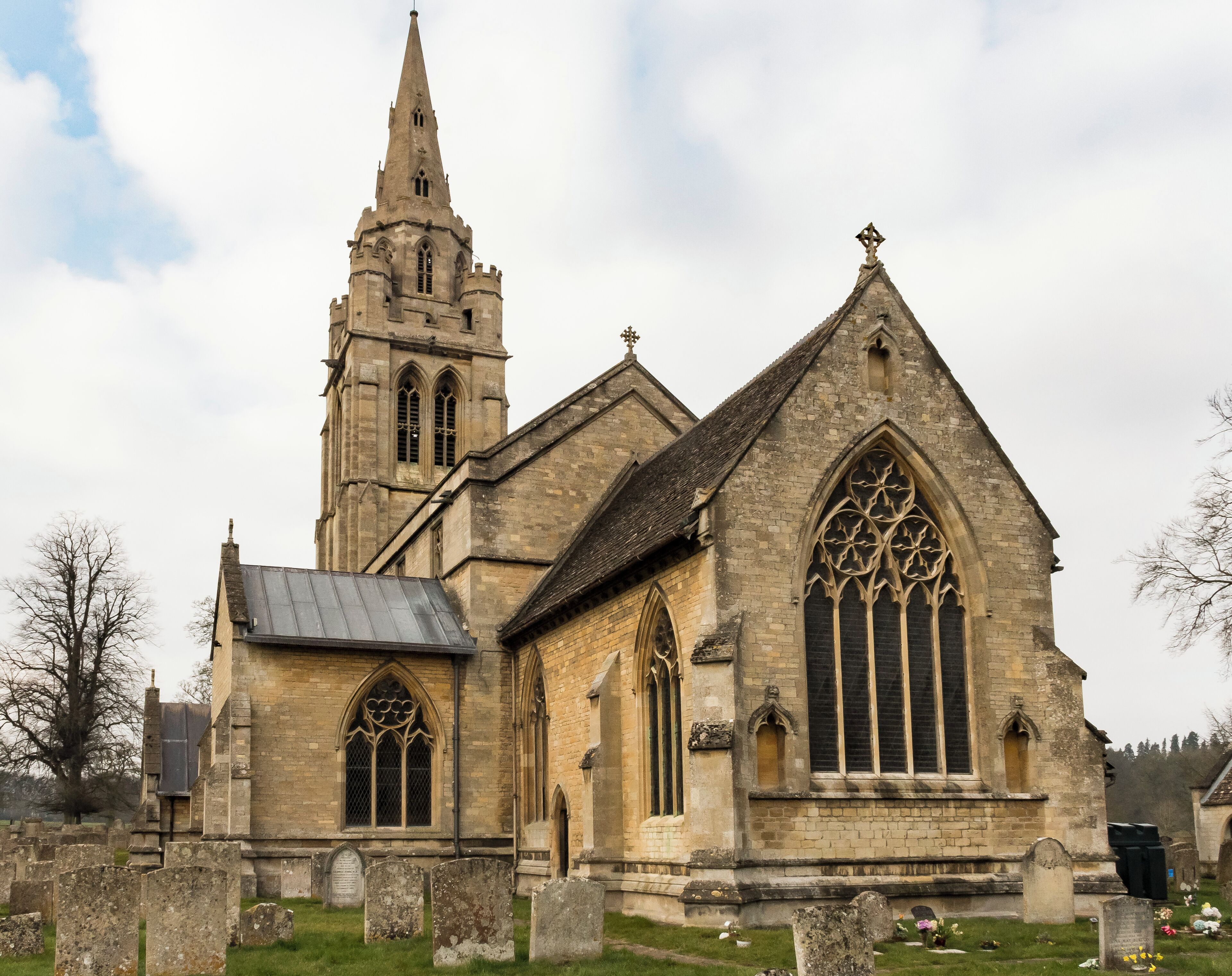 The present church dates from the 13th and 14th centuries, although it was much restored in Victorian times. In fact the whole appearance makes it seem Victorian. The cause of the restoration was a hailstorm on 25th April 1843 when the spire was struck by lightning and masonry fell into the nave destroying the roof and the old gallery at the west end. The vicar at the time, the Honourable and Reverend Leland Noel (a brother of the Earl of Gainsborough), immediately began the work of restoration and employed a young London architect, Richard Cromwell Carpenter (1812-55). Apparently he found much needed doing, not just as a result of the lightning strike. He would have liked to do a great deal but a dispute arose between the Vicar and the parish. Whatever the reason he was replaced in 1851 by well-known architect John Loughborough Pearson. Pearson had also worked on the tower and choir of Peterborough Cathedral.