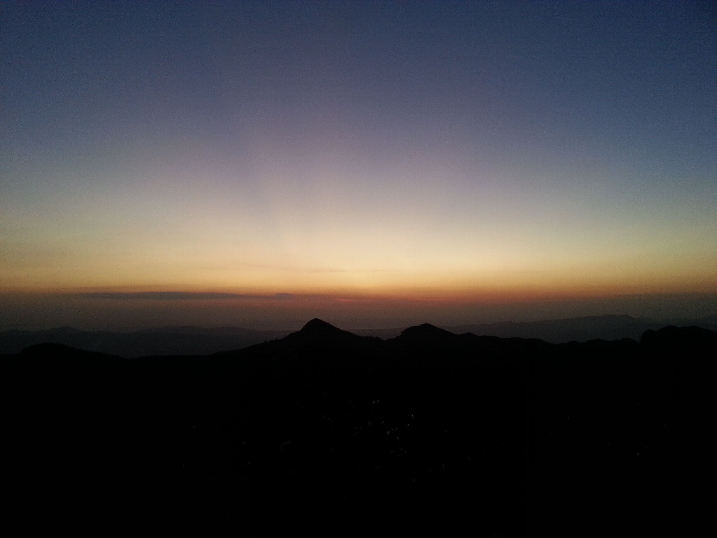 I guess the best colors from a sunset can be best seen from the peak of a mountain. The combination of blue, yellow, orange and black blended so well they make you feel everything went well the rest of the day and something great will happen on the coming night.
#sunset #horizon #bestcolors #peak #mountains 