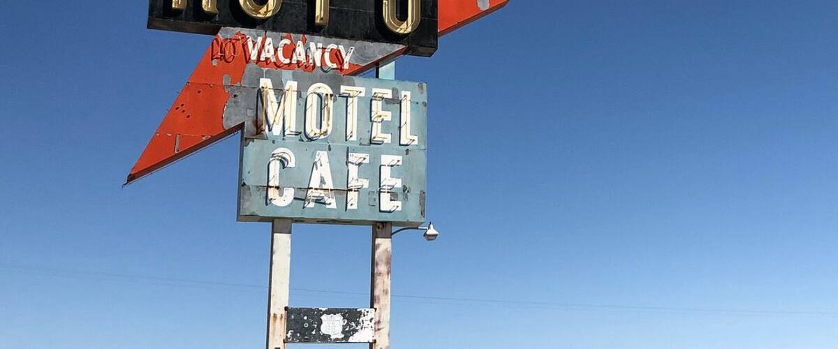 When traveling through California along Route 66, you can find the defunct Roy's Motel and Café, which used to be a motel, café, gas station and auto repair shop in the Mojave Desert town of Amboy. This sign, in the middle of nowhere, makes a great photo op—plus, a place to stop and grab a snack at the restored coffee shop before you hit the road again. #LifeAtExpediaGroup #Route66 #RoadTrip
