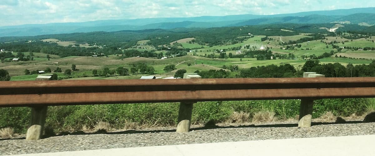 Beautiful country in the heart of Maryland with blue skies and rolling hills. Very peaceful place to spend an afternoon, especially looking out at this view!