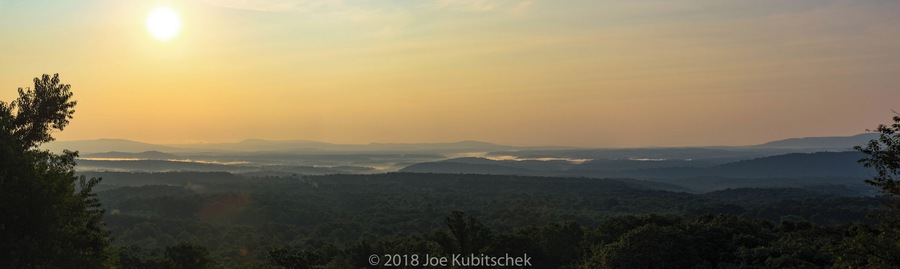 In the early morning hours of the day, at a rest stop, I was able to capture this moment with the fog as the sun rose.