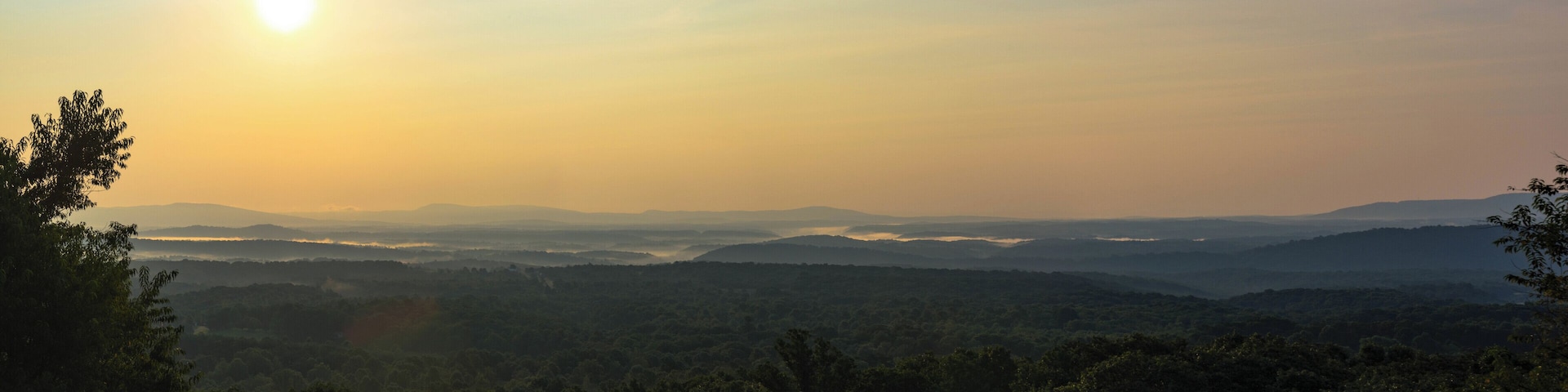 In the early morning hours of the day, at a rest stop, I was able to capture this moment with the fog as the sun rose.