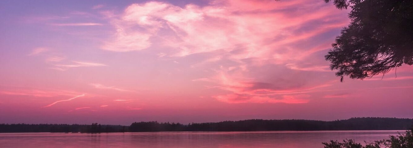 Looking across Massabesic Lake from the east shore looking west on an evening where the sky was on fire.