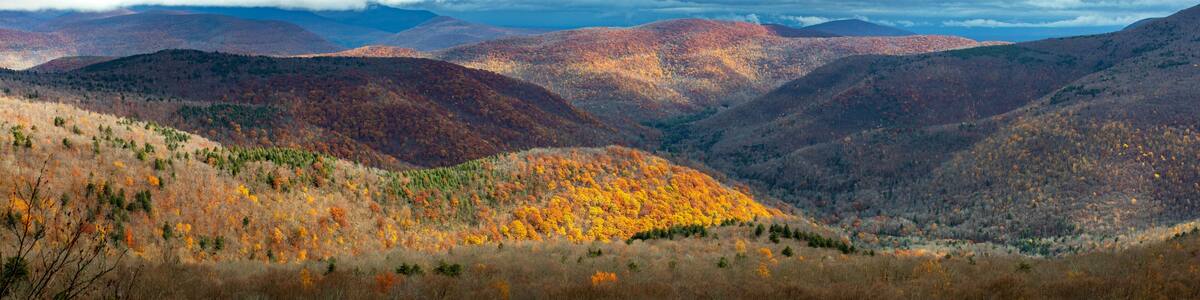 Large panoramic view of Catskills mountains at fall from above
