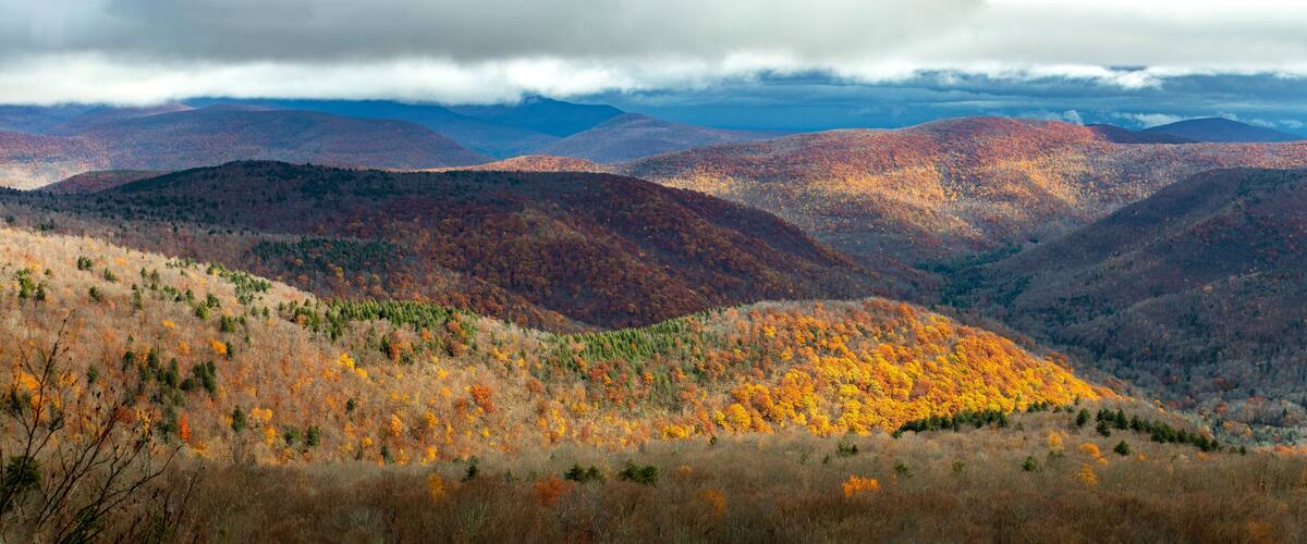 Large panoramic view of Catskills mountains at fall from above