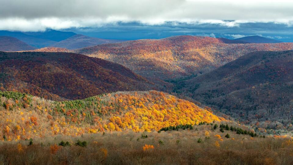 Large panoramic view of Catskills mountains at fall from above