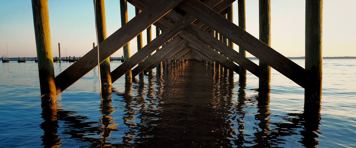 View beneath the pier at the Neuse River estuary at a park in Arapahoe North Carolina.