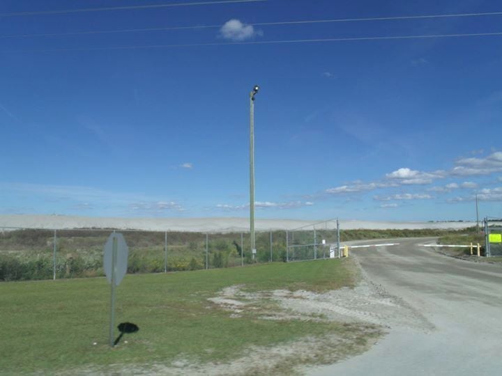 The mining area stretched for miles and miles. Desolation and absence of life. Not a beautiful sight but wanted you all to see how industry can strip the country side to produce pollutants. The gray hills are the reside of the mining and refining operations. The lakes you see in the picture are toxic.
