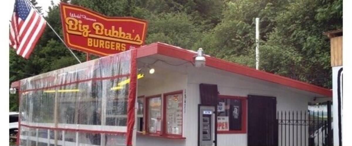 A fast-food restaurant named Big Bubba's Burgers with a menu listing various burgers and sides.