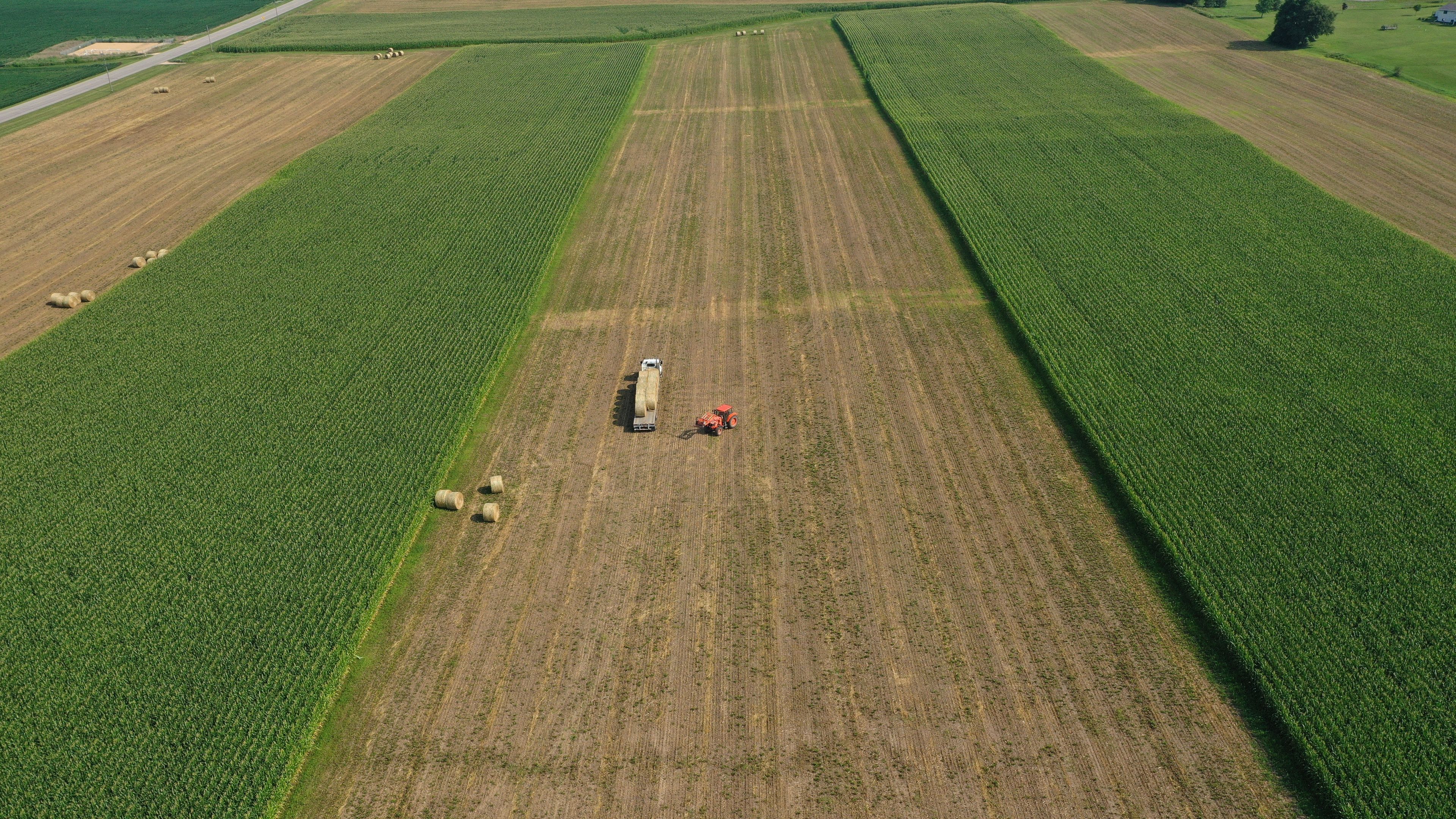 Wisconsin Farmer working in Field (Aerial Drone Photography) 