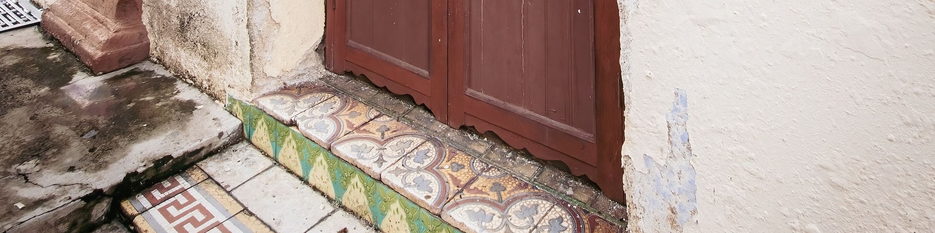 Old vintage wooden doors of a house dated 1920 in Kuala Pilah, Malaysia.