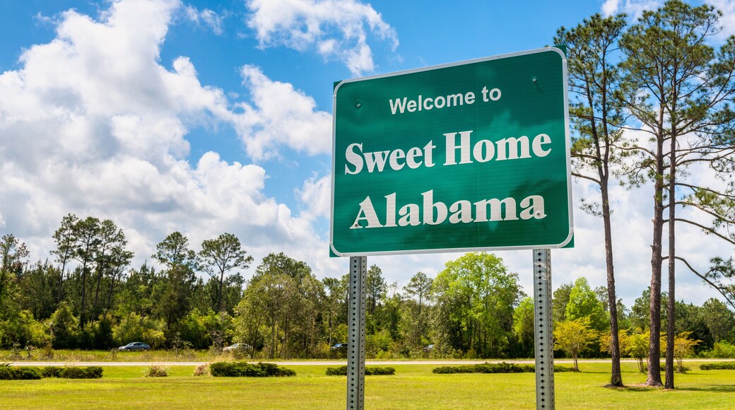 Welcome to Sweet Home Alabama Road Sign along Interstate 10 in Robertsdale, Alabama USA, near the State Border with Florida