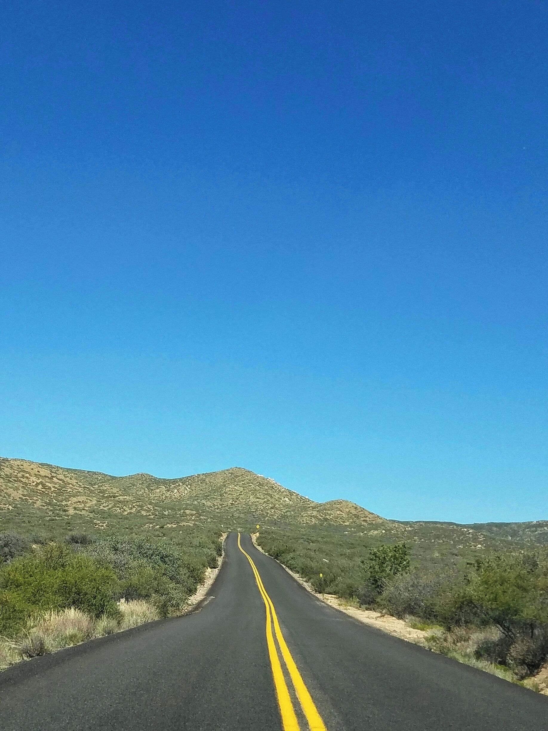 Off of 169 pretty much in the middle of nowhere.
Old mining town that was named for the wild cherry trees that grew there.  
If you are into wide open spaces and distant mountain views, it's a nice drive.
