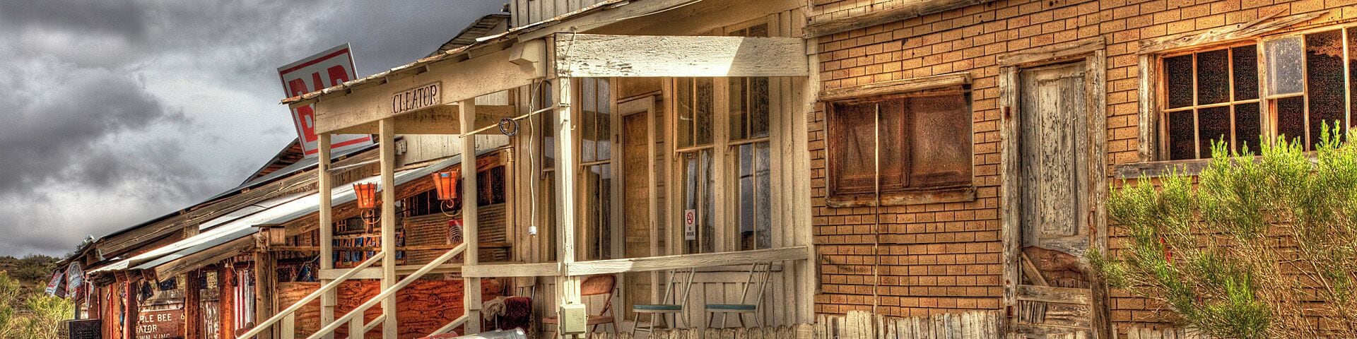 An old, weathered building with a sign that reads "James General Store."