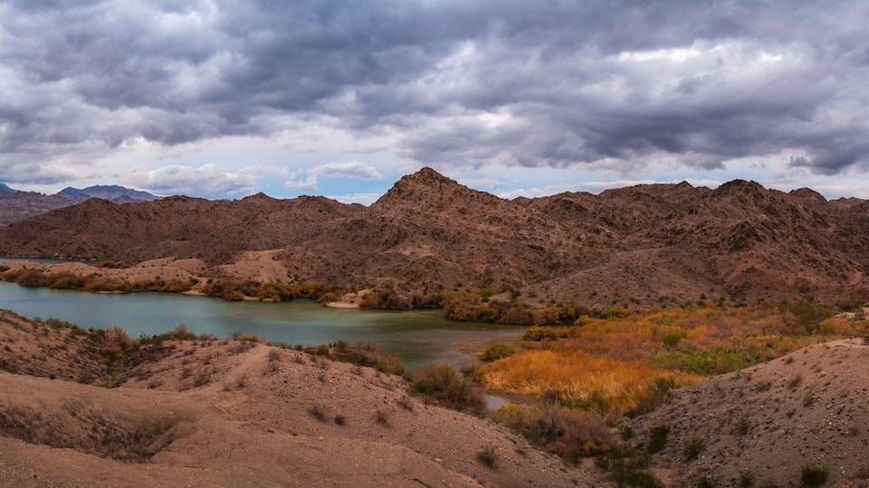 Colorado River Landscape Series, tranquil wilderness with views of Black and Spirit Mountains and Squadron Peak Mountain, at Mojave Lake in Bullhead City, Arizona, USA