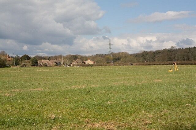 Little Frenchies Field, Denmead There has been controversy over whether or not this field should be allocated for housing. Surveying was underway when I photographed it. Green Lane forms one side of this field. Whether the field itself will stay green remains to be seen.