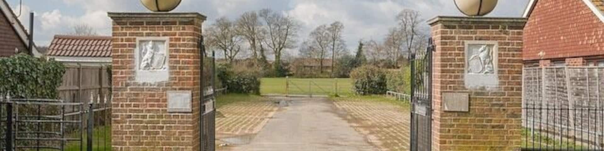 Entrance to King George's Field, Denmead From ashling Park Road. The field is a recreation ground.