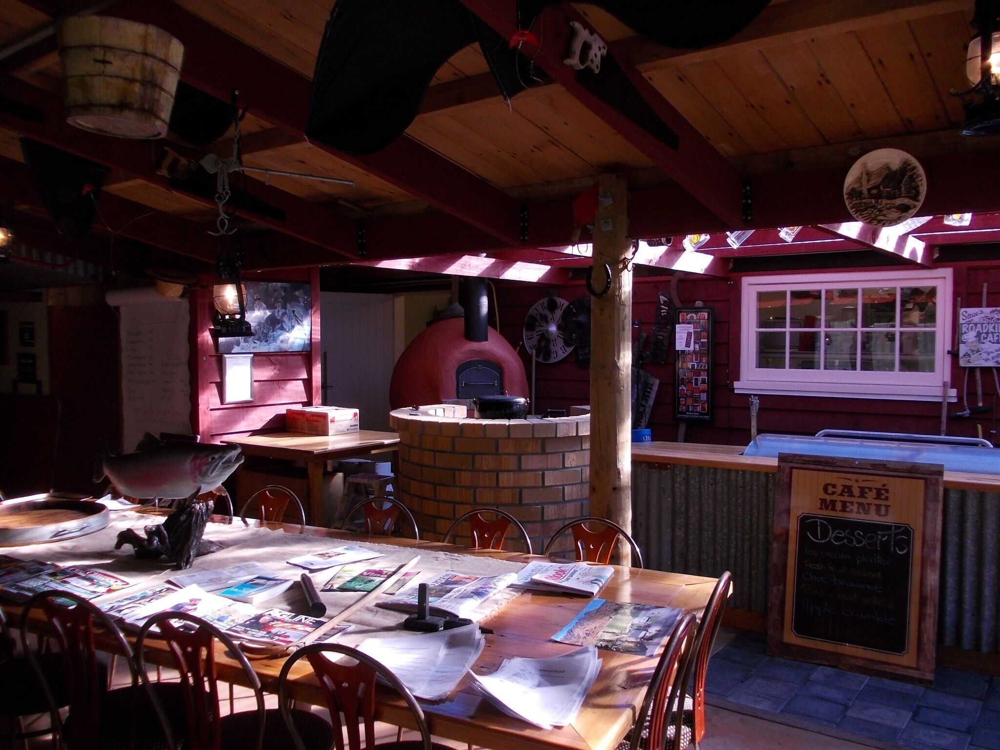 This is a cute little place (I forgot the name and didn't take the picture of the posting! So if anyone knows please help). In was on route 7 leaving Hanmer Springs on the way to Christchurch. The men was sitting on the porch with his Australian shepherd dog ( black and white). Anyway food is good, you can walk through the winery. The people are great and you can buy great wine from there. 