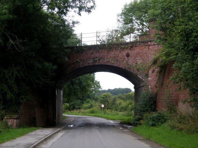 Railway Bridge near Goodmanham, East Riding of Yorkshire, England. This red brick arched bridge, along Goodmanham Road out of Market Weighton, used to carry the now dismantled Market Weighton to Driffield railway line.