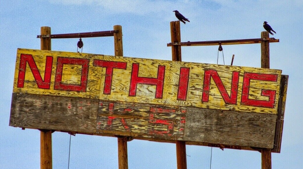 Well.....
This is it.
Just the sign.
But if you turn at this sign down the dirt road, you will enter a Giants play ground of Boulders thrown here and there that make it a great place to explore..
Stay on 93 S and you will drive through a wonderful Forrest of Joshua Trees