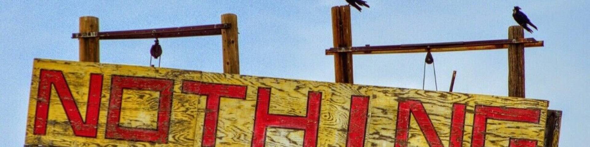 Well.....
This is it.
Just the sign.
But if you turn at this sign down the dirt road, you will enter a Giants play ground of Boulders thrown here and there that make it a great place to explore..
Stay on 93 S and you will drive through a wonderful Forrest of Joshua Trees