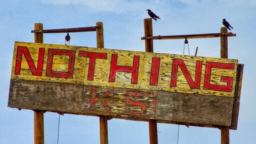 Well.....
This is it.
Just the sign.
But if you turn at this sign down the dirt road, you will enter a Giants play ground of Boulders thrown here and there that make it a great place to explore..
Stay on 93 S and you will drive through a wonderful Forrest of Joshua Trees